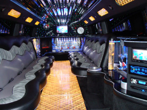 Luxurious H2 Hummer Limo with a Music System and Leather Seats