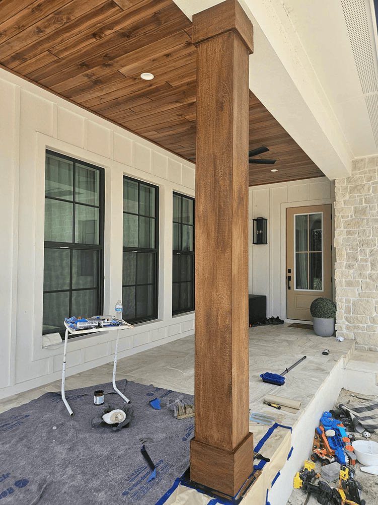 Porch renovation with wood column and tools