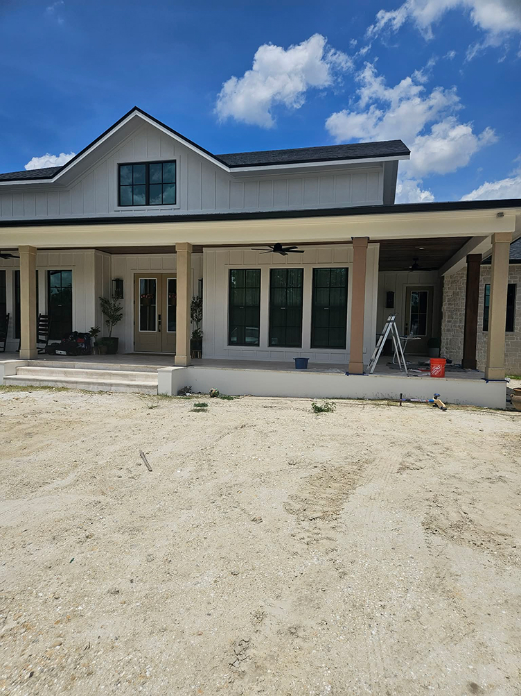 Modern farmhouse with wide covered porch