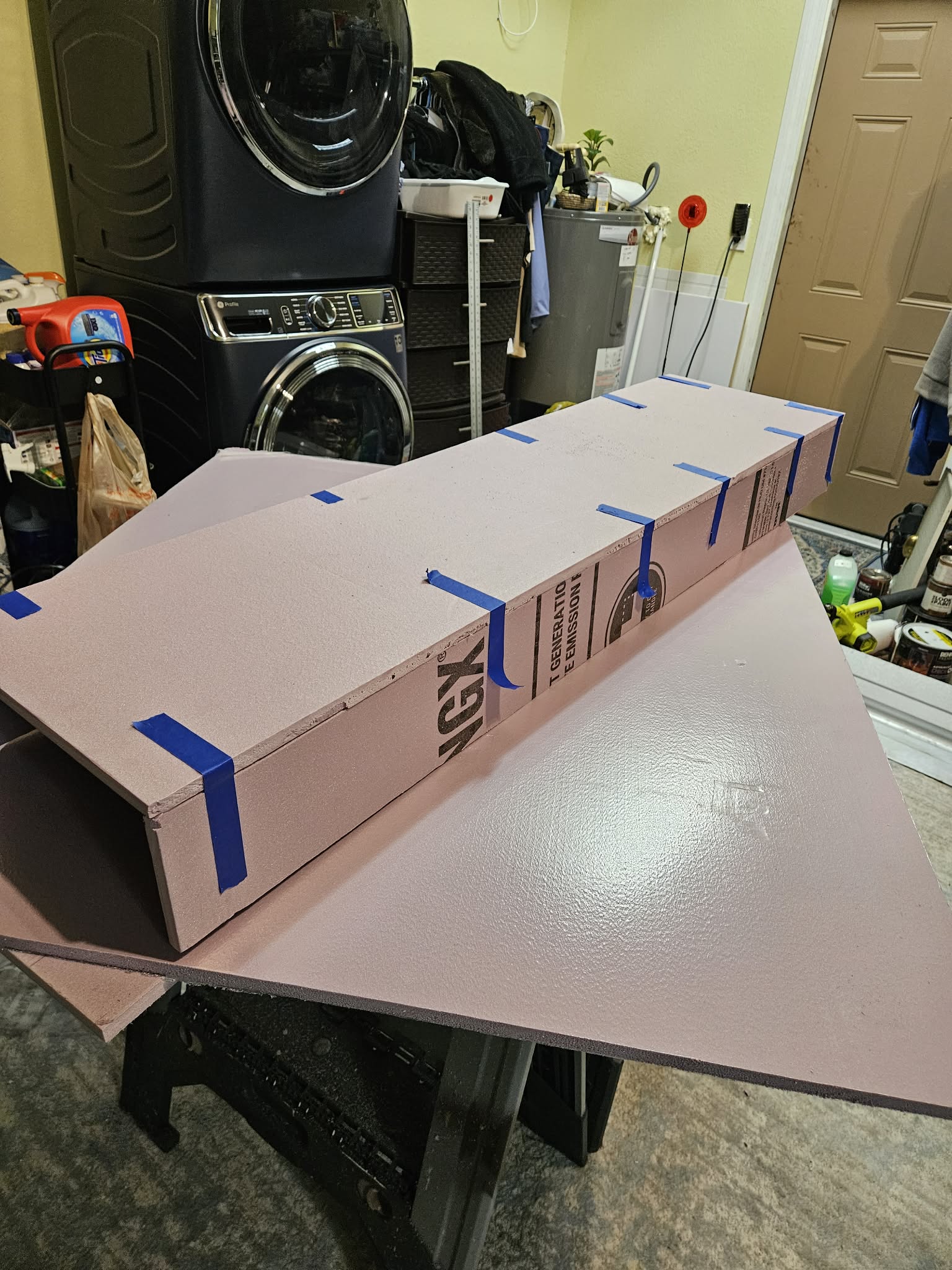 Pink foam insulation boards on worktable